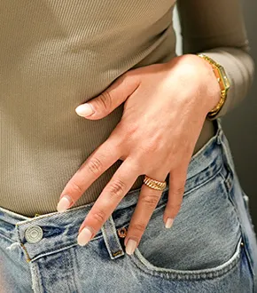 Woman wearing gold open ring